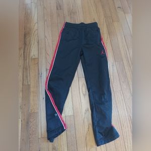 Jordan track pants  Size Boy's medium  black red stripe